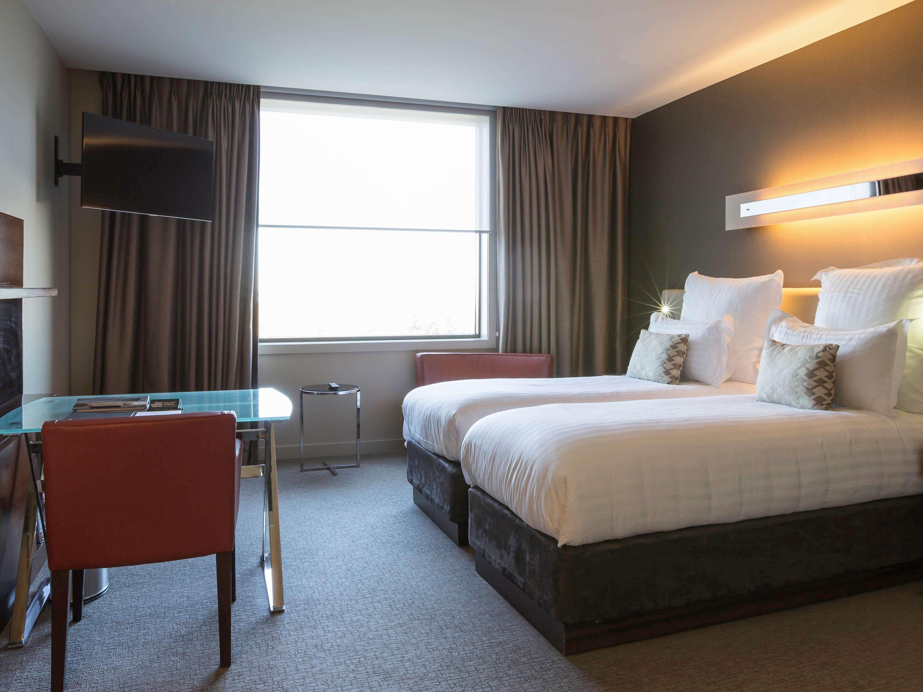 พูลแมน แอต ซิตนีย์ โอลิมปิก พาร์ค Hotel ซิดนีย์ ภายนอก รูปภาพ A room at the hotel