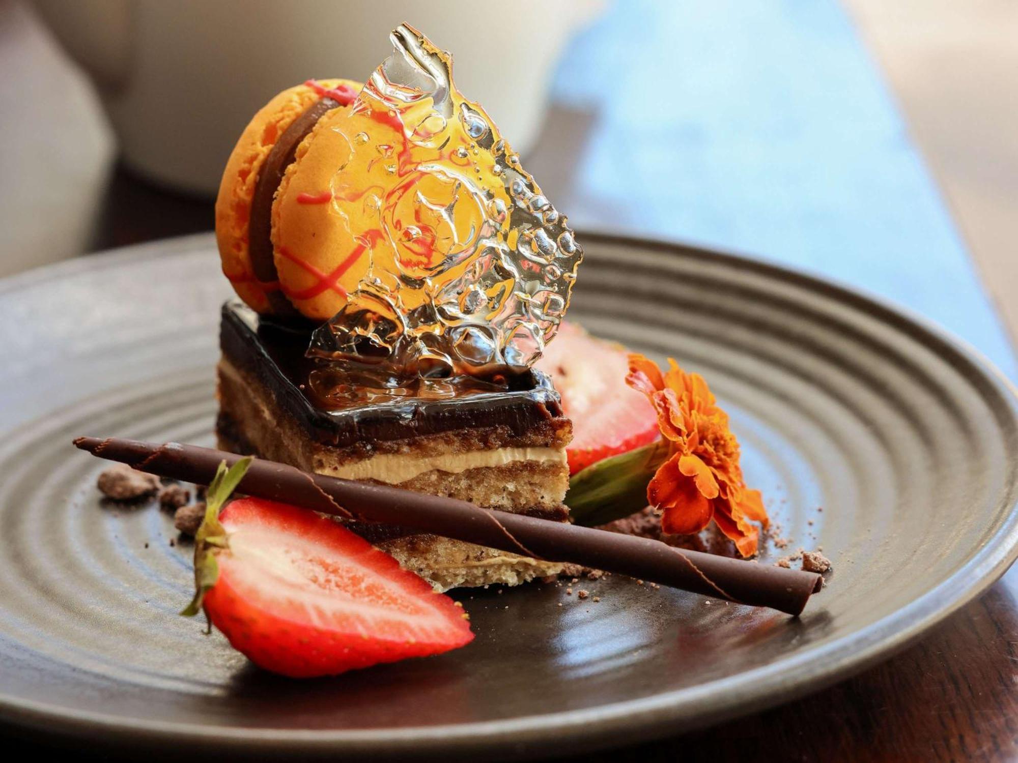 พูลแมน แอต ซิตนีย์ โอลิมปิก พาร์ค Hotel ซิดนีย์ ภายนอก รูปภาพ A chocolate cake