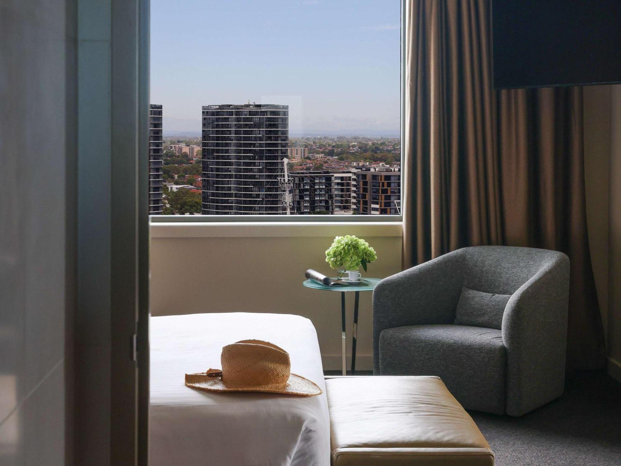 พูลแมน แอต ซิตนีย์ โอลิมปิก พาร์ค Hotel ซิดนีย์ ภายนอก รูปภาพ A room at the hotel