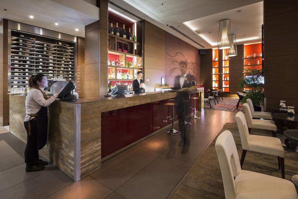 พูลแมน แอต ซิตนีย์ โอลิมปิก พาร์ค Hotel ซิดนีย์ ภายนอก รูปภาพ The bar at the lounge